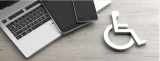 A laptop, tablet, smartphone, and the disability icon